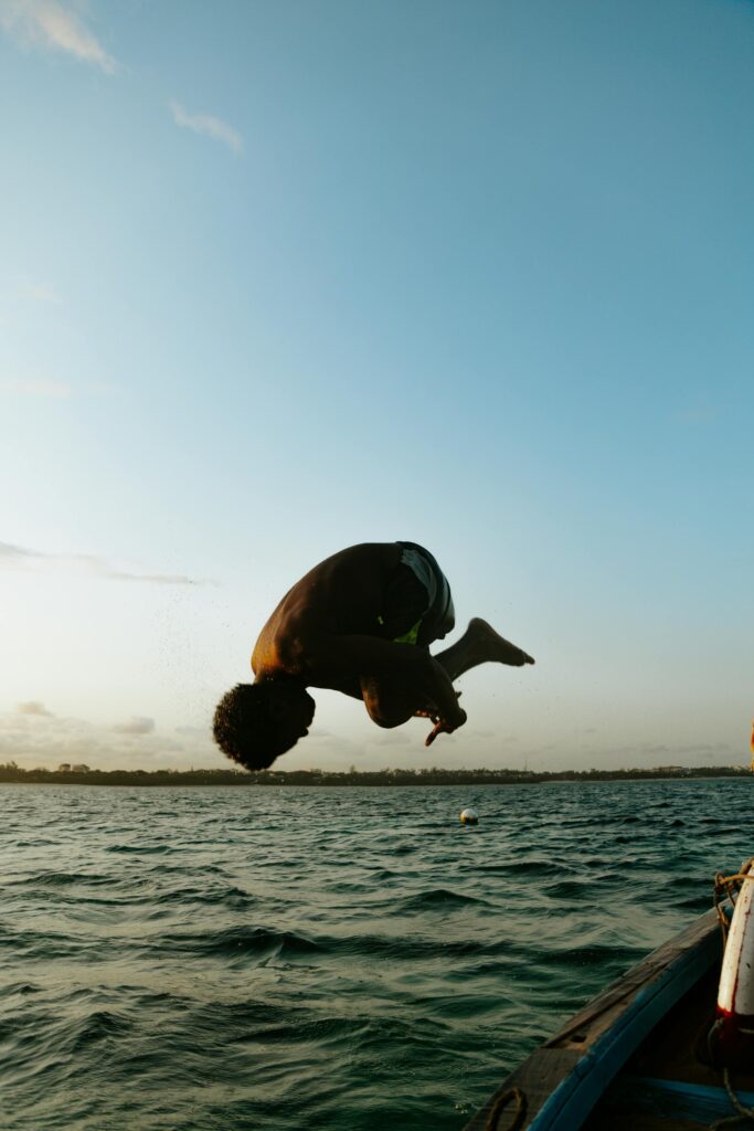 -man-diving-into-the-water-from-a-boat-Mombasa-City